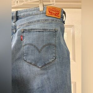 Levi’s 311 shaping skinny ladies jeans, minimal factory rips, stretchy